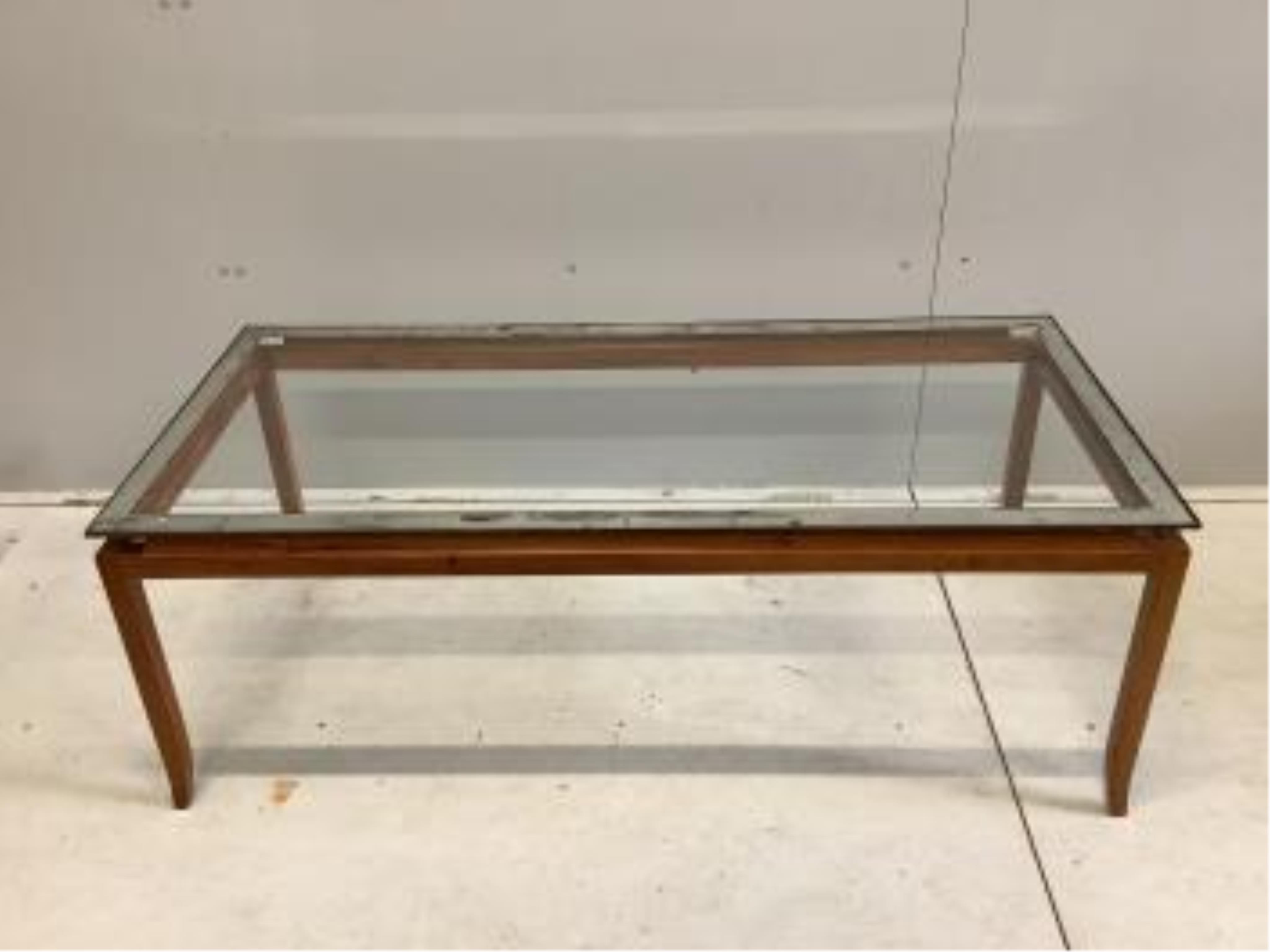 A mid century teak glass top coffee table, width 125cm, depth 58cm, height 45cm. Condition - fair